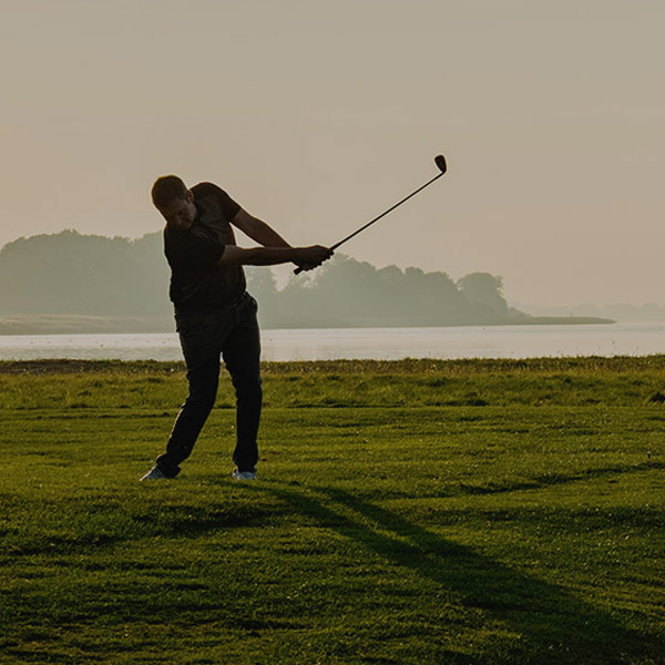 man golfing on beautiful golf course in South Carolina